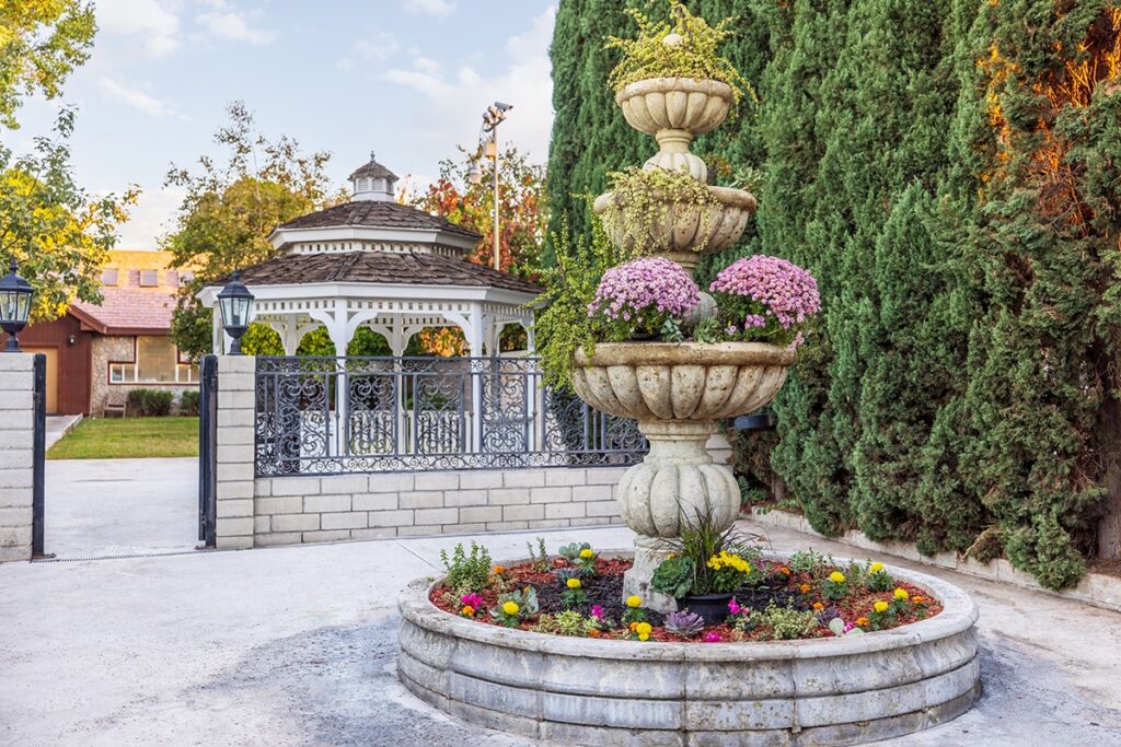 Waterman courtyard with flowers in fountain