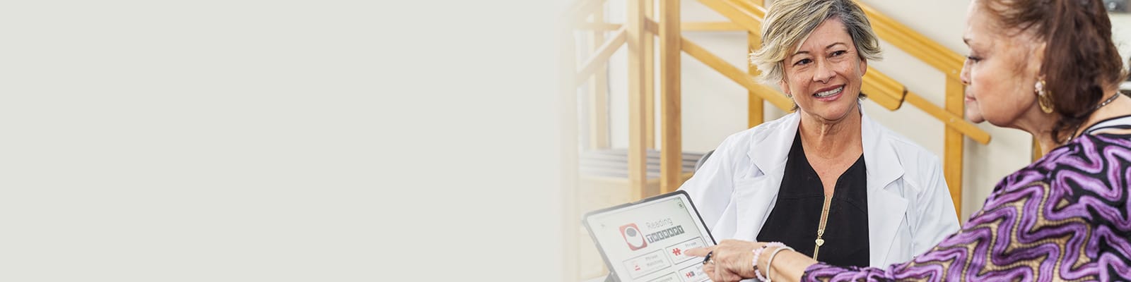 A speech therapist working with a resident at Waterman Canyon