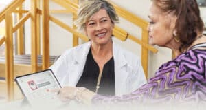 A speech therapist working with a resident at Waterman Canyon